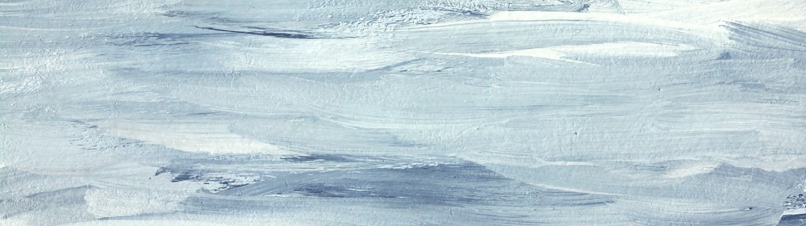 Abstract blue and white textured painting background.