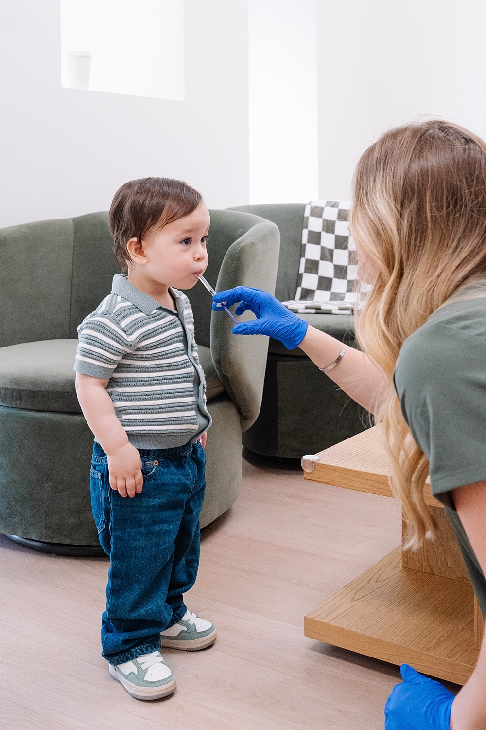 Child receiving Allergy treatment in clinic.