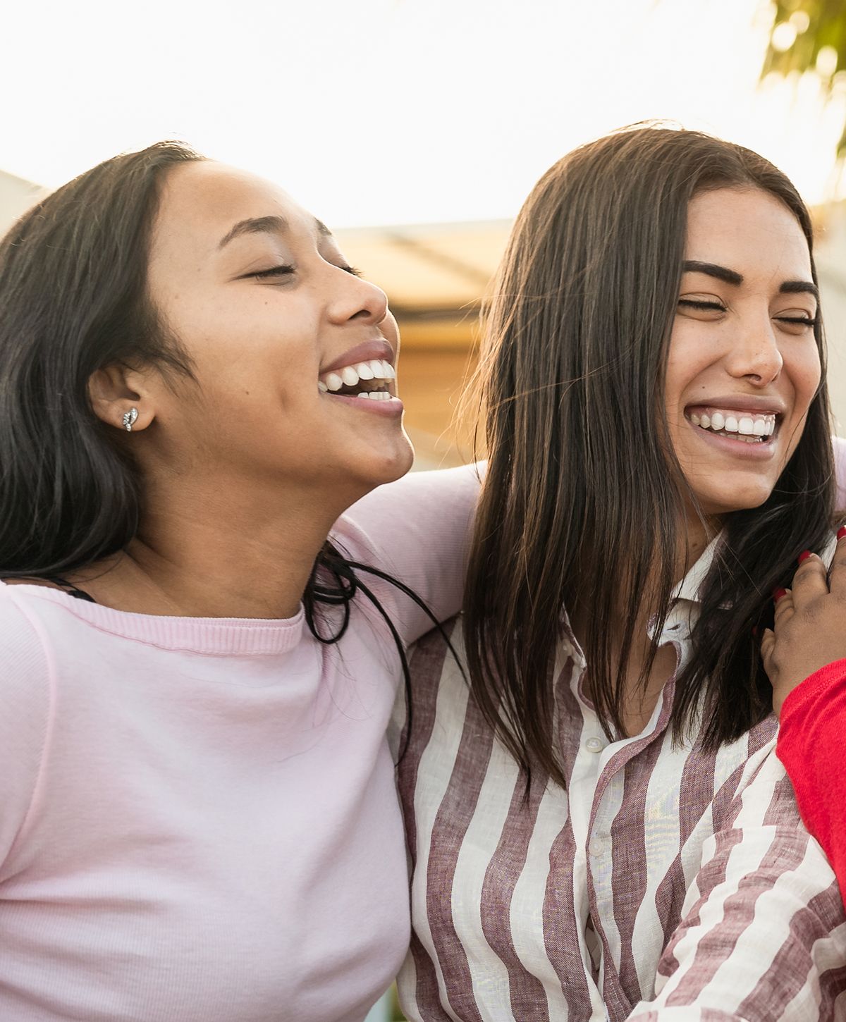 Smiling friends enjoying joyful moment together.