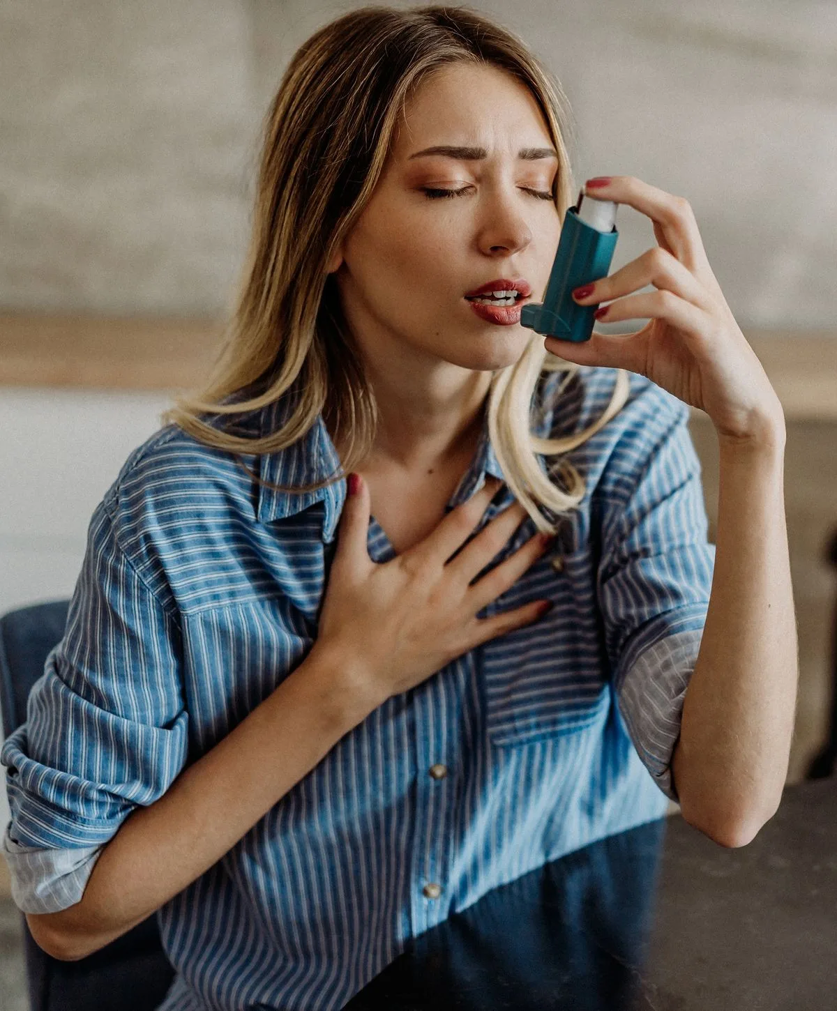 Woman using an breathing care plans, experiencing breathing difficulty.
