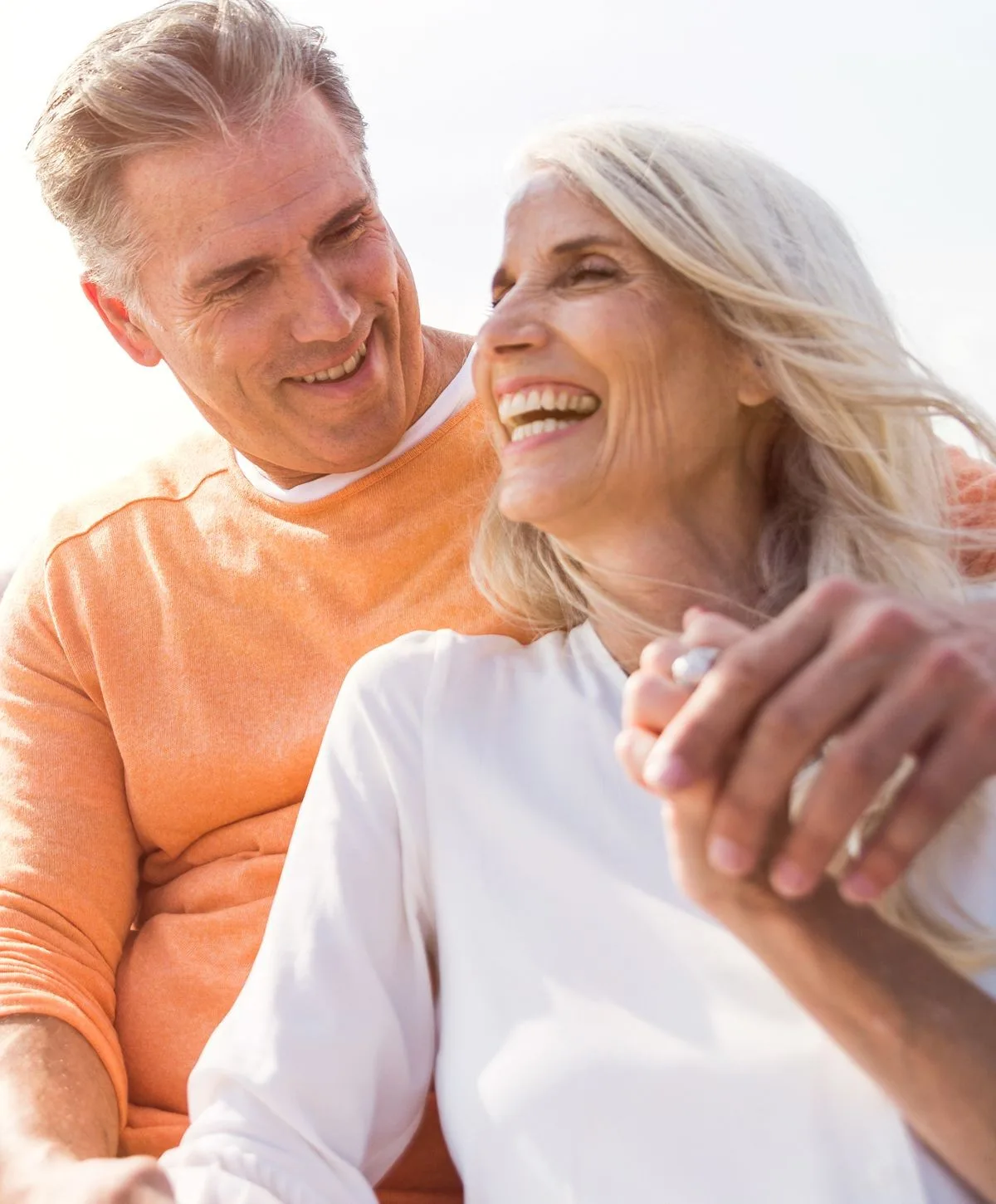 Happy couple enjoying a joyful moment together.