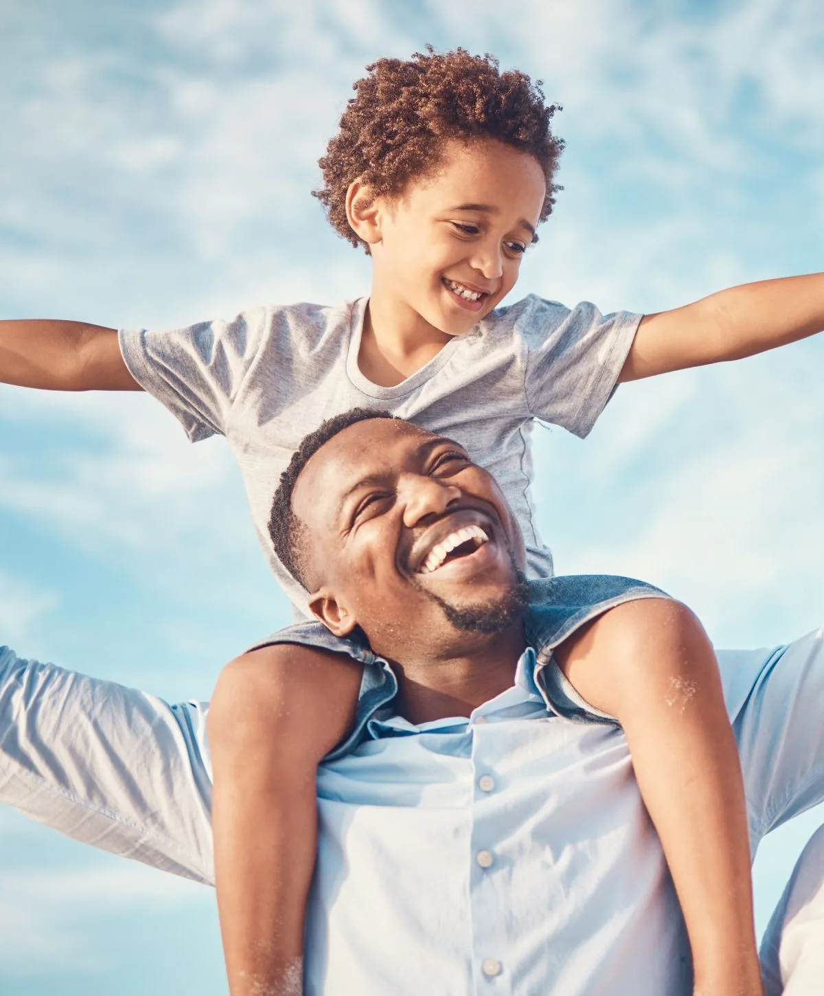 Father and son enjoying a joyful moment together.