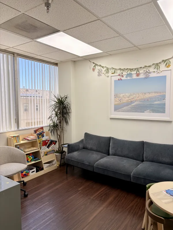 Child-friendly waiting area inside the Modena Health Long Beach office.