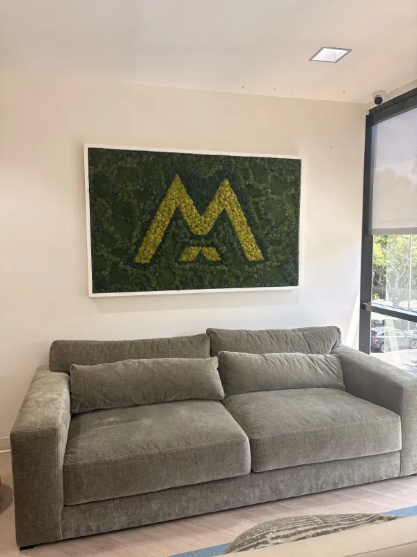 Waiting area with the Modena Health logo at the Solana Beach office.