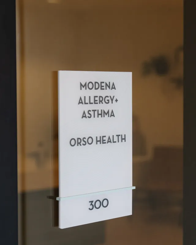Suite 300 entrance sign for Modena Allergy + Asthma at the Solana Beach office.