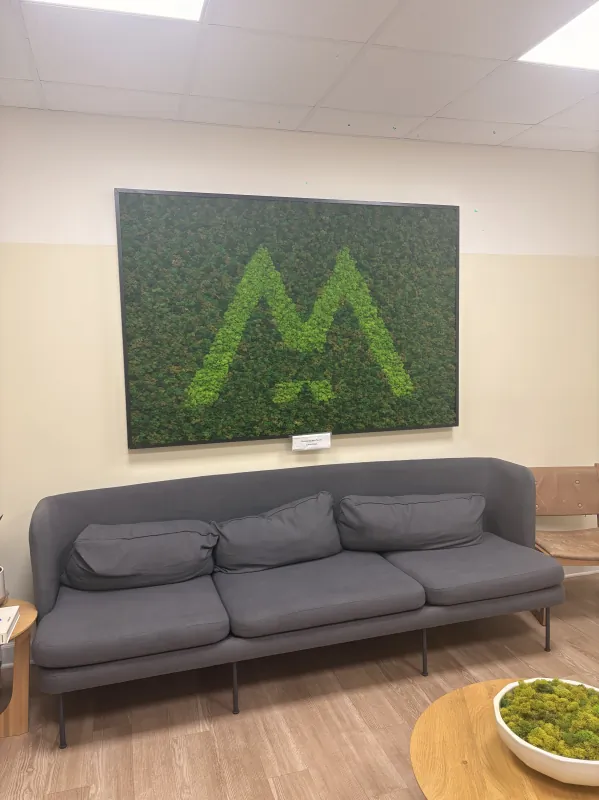 Waiting area with the Modena Health logo at the Torrance office.